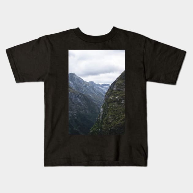 Large Moody Mountains During Blue Hour New Zealand Kids T-Shirt by Danny Wanders